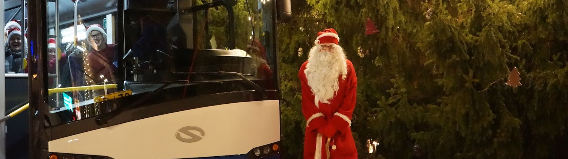 Santa Clause rides an electric bus of Solaris